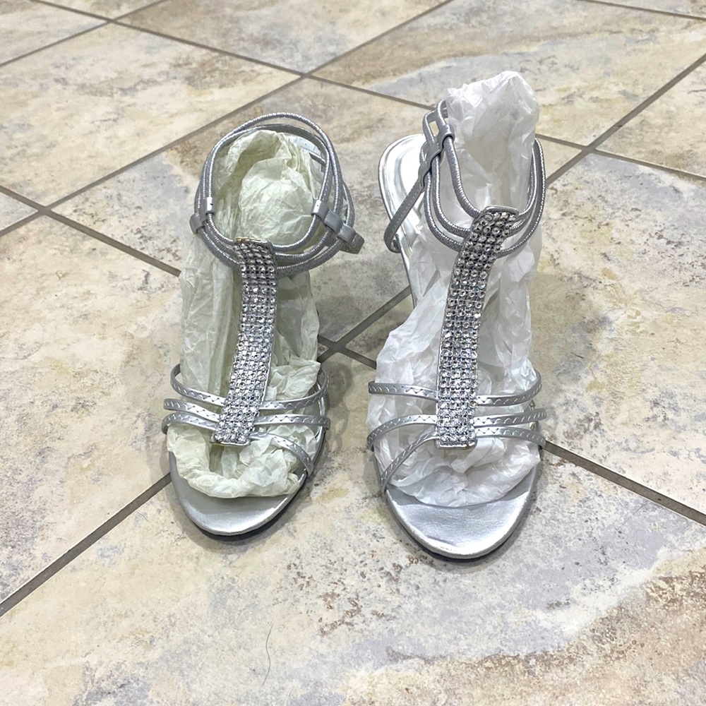 Silver strappy hi heals. Brand new